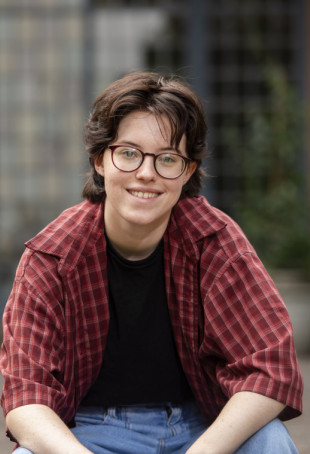 Apollo Baeber sitting and smiling