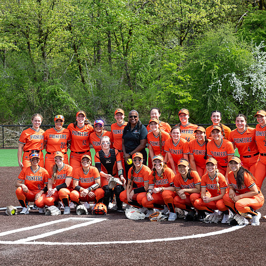 Softball team with President Robin