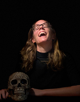 Ritchey poses with a skull as part of the photo session for her book, Composing Capital: Classical Music in the Neoliberal Era (UChicago ...