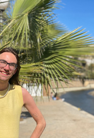 Jeremy posing outside while on their overseas program in Spain.