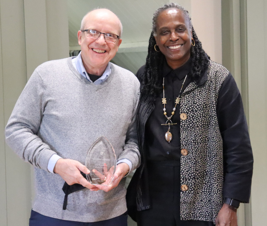 Picture of Mark Duntley receiving the Highest award that is now renamed after him.
