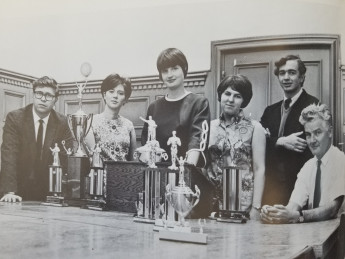 George Austin (left), Jean Ward (third from left), Neil Sabin (right), along with members of the L&C team