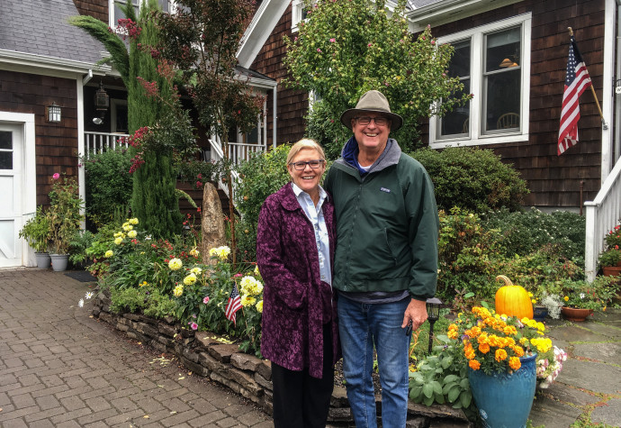 Niels and Judi Marquardt outside their renovated 1890 farmhouse near Multnomah Village.