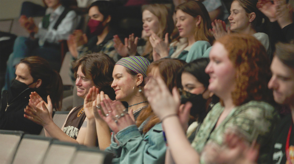 Audience enjoys performance by alum Laser Webber