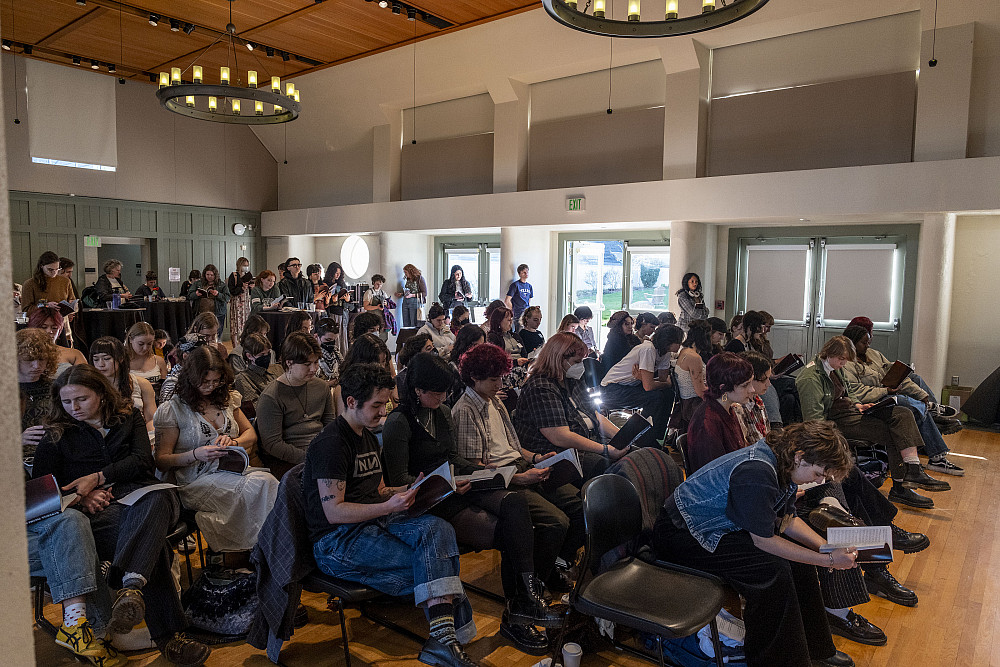 seated crowd in room