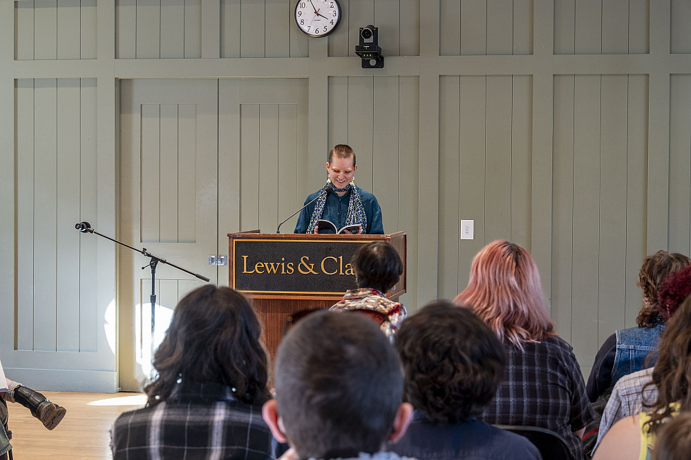 Person at podium in front of an audience