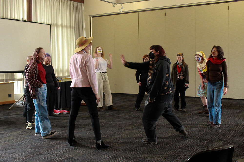 A group of people standing in a circle.