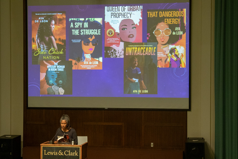Keynote speaker Aya de León reads from one of her books