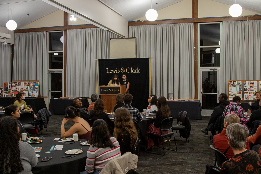 Cochairs Mithila Tambe and Lucinda Law share remarks at the opening reception celebrating the 20th annual symposium
