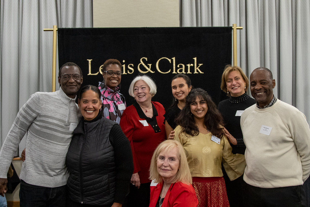 Co-chairs Lucinda Law and Mithila Tambe with members of the Warren family at the opening reception