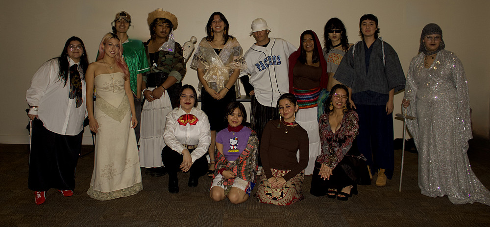 All participants in the fashion show, posing in their outfits