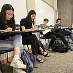 Students writing.