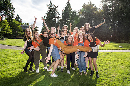 New Student Peer Mentors pose on the Glade.