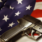 Handgun lying on American flag