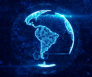 Planet Earth showing countries in glowing blue color to represent digital information.