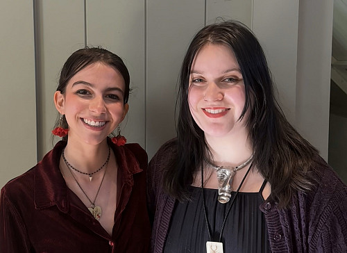 2 smiling women