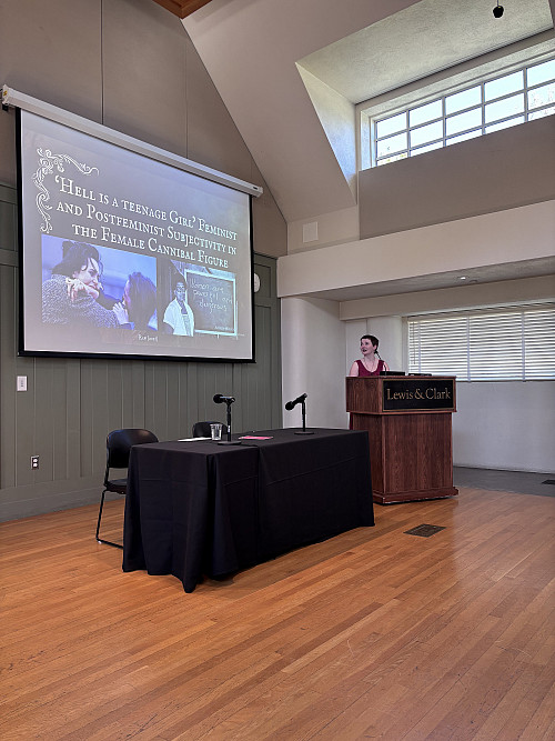 Zoë Smith '25, shares the opening slide for “Hell is a Teenage Girl: Feminist and Postfeminist Subjectivity Through the Femal...