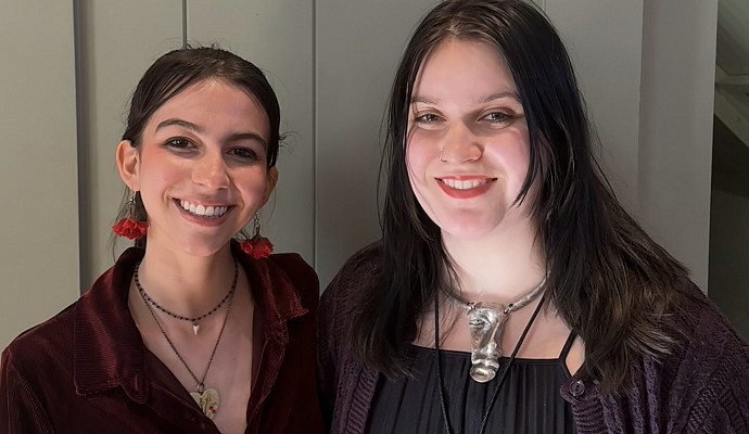 2 smiling women