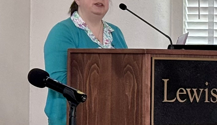 Woman at podium