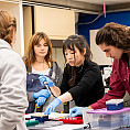 Students working at a lab table.