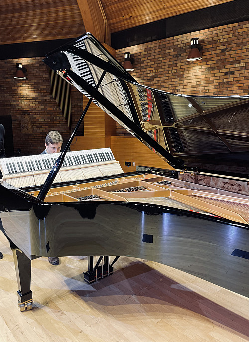 Luca Fazioli inspecting the instrument