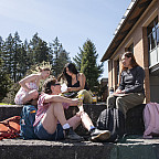 Students lounge in the sun.